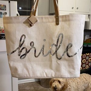 Mud pie “bride” bag.